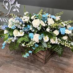 Calm blue and white Casket spray