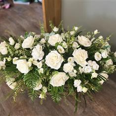 Elegant white and green casket spray